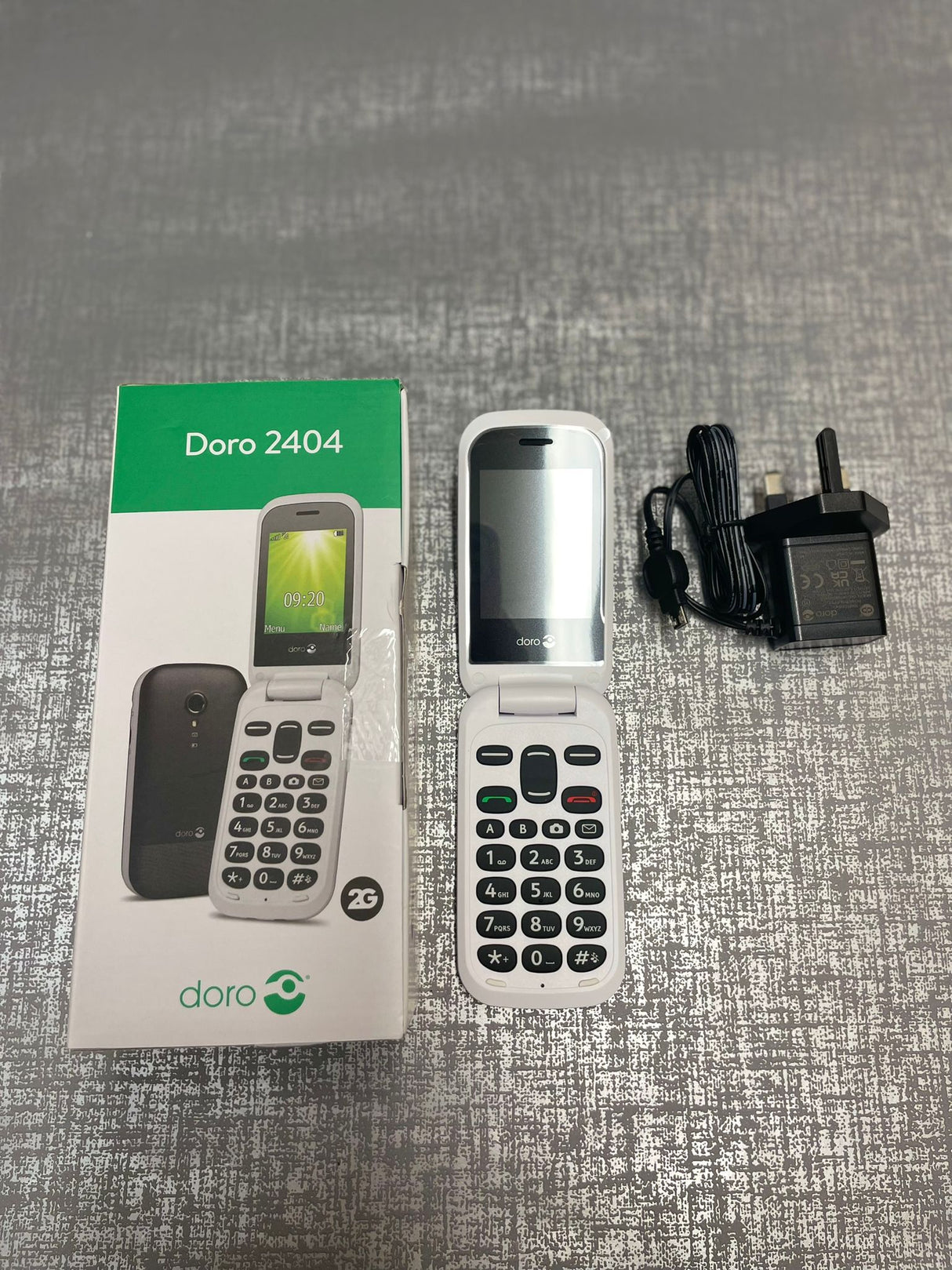 Brand New Irish Doro 2404 Flip Button Phone Black